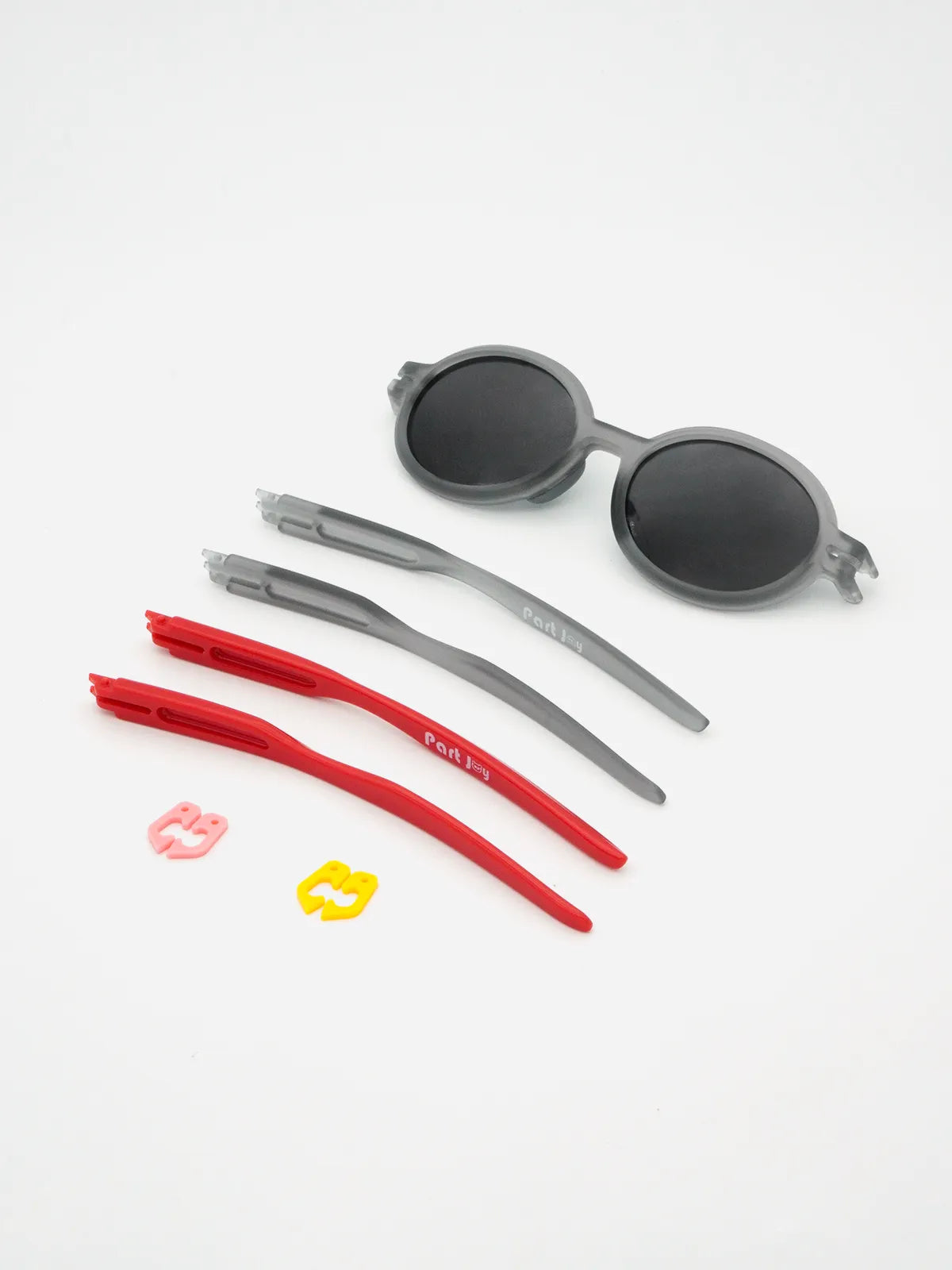 Gray and red interchangeable temple pairs supplied with the frame
